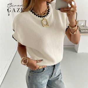 Cream Sleeveless Knit Top with Black Trim